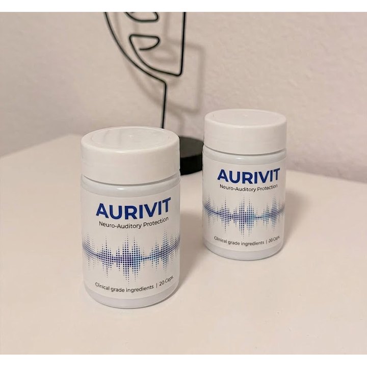 Dwa białe słoiczki Aurivit z niebieskim napisem, grafiką fali dźwiękowej i napisem Neuro-Auditory Protection, 20 Caps